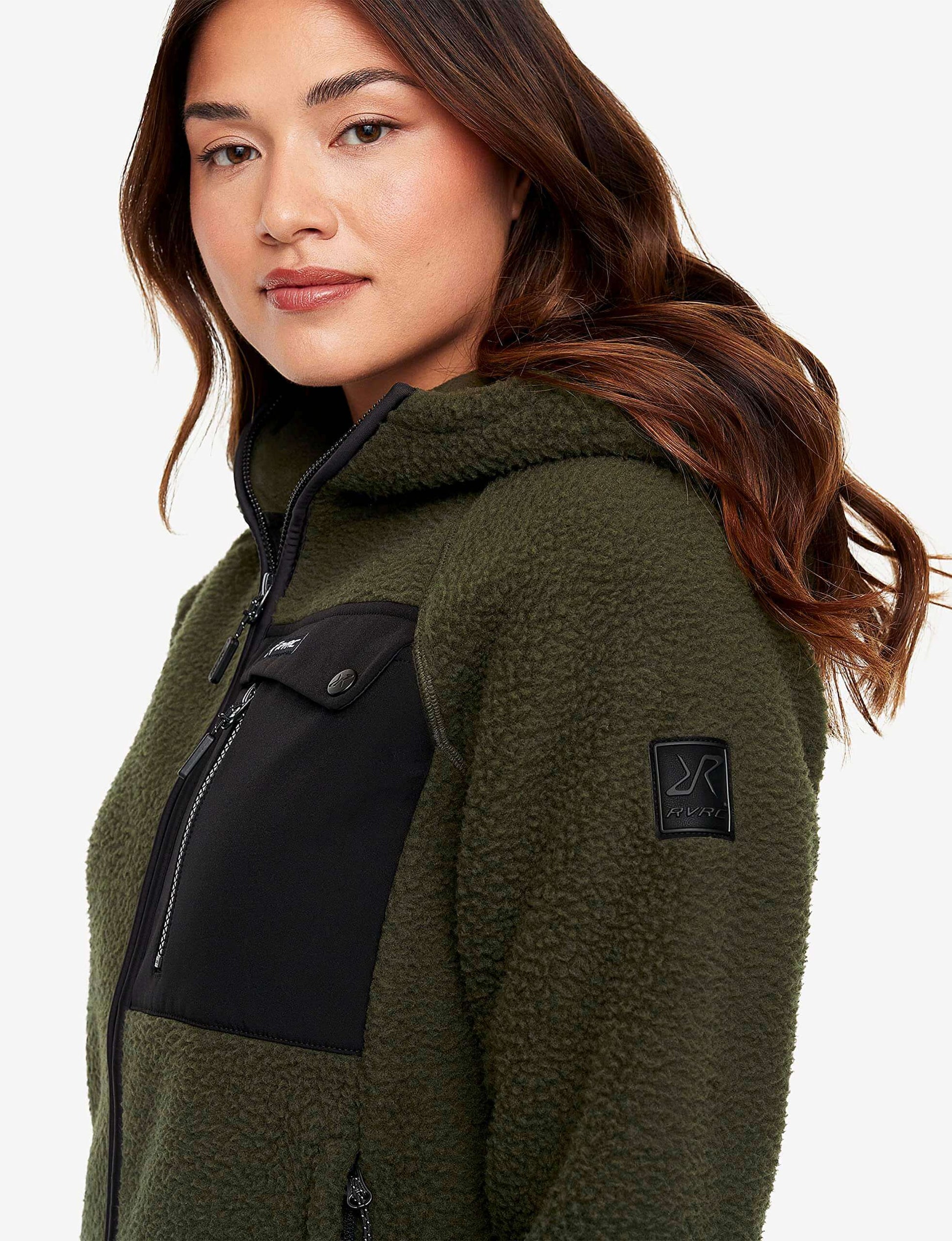 Image Showing RevolutionRace Sherpa Hoodie for Women, Fleece Jacket Perfect for Hiking and Outdoor Adventures - Product Type Women's Fleece Jacket - Buy Now $152.25 - Adventure Gear from Global Trekker