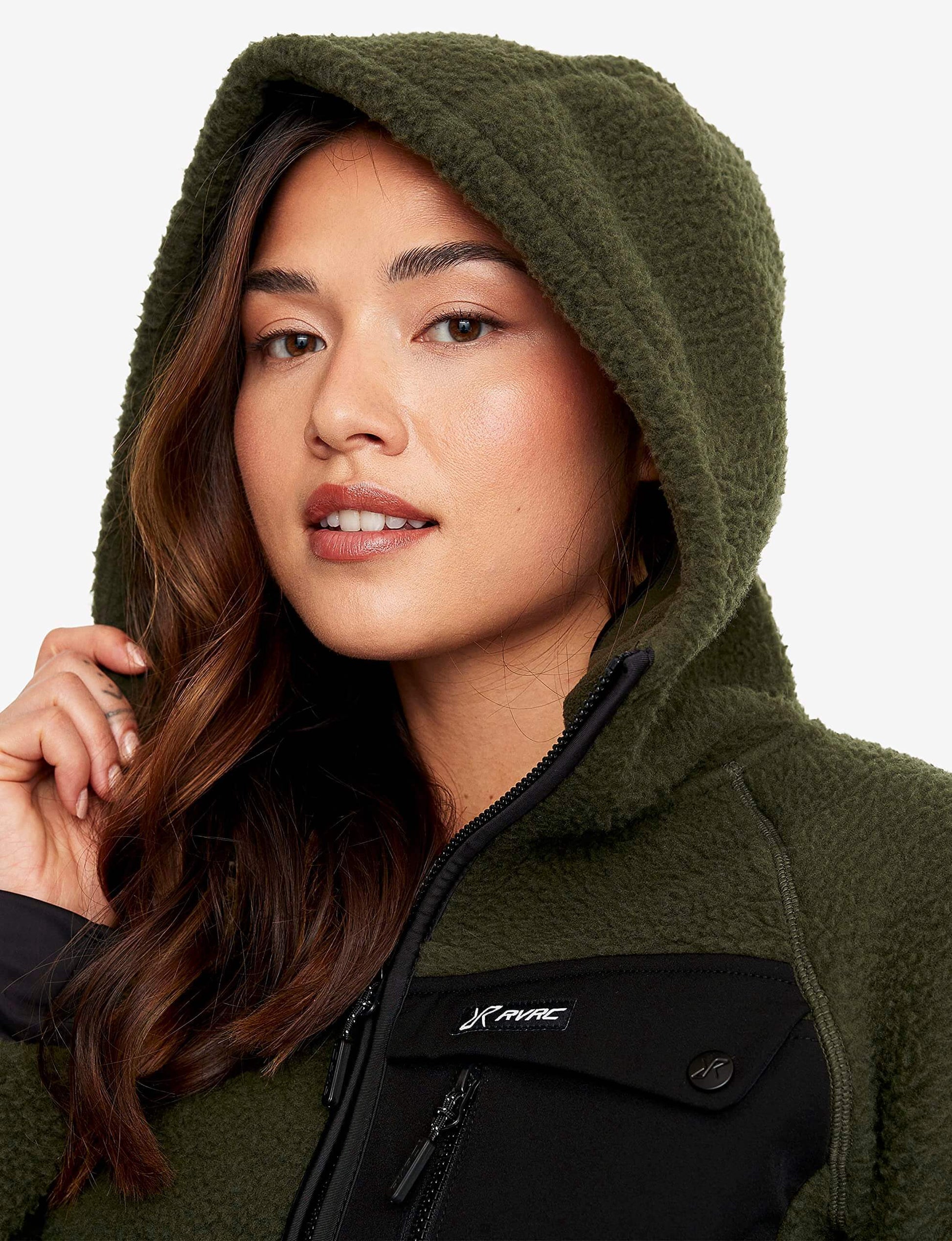 Image Showing RevolutionRace Sherpa Hoodie for Women, Fleece Jacket Perfect for Hiking and Outdoor Adventures - Product Type Women's Fleece Jacket - Buy Now $152.25 - Adventure Gear from Global Trekker