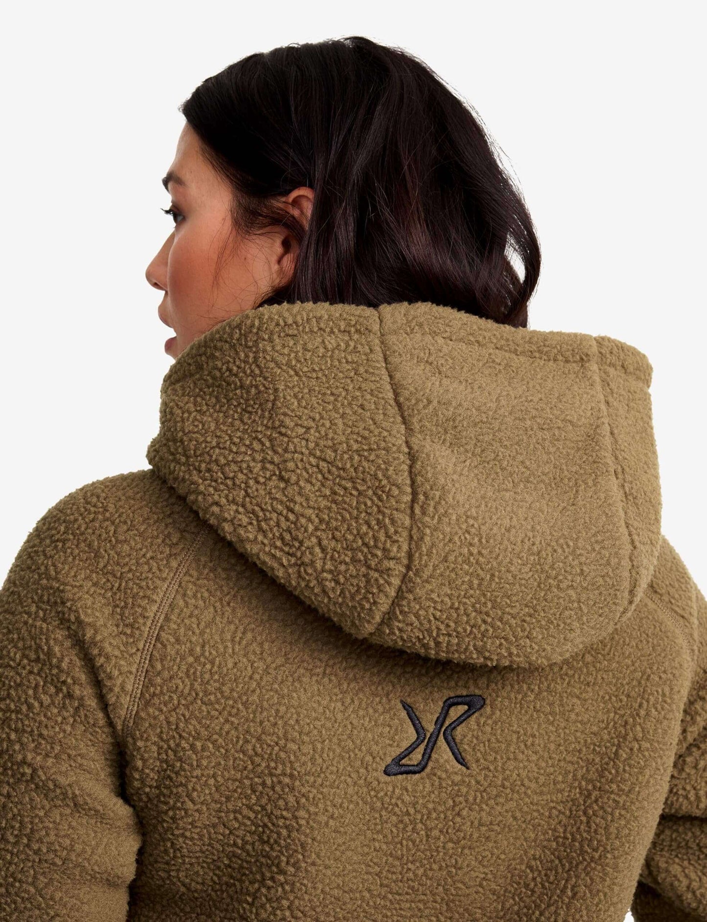 Image Showing RevolutionRace Sherpa Hoodie for Women, Fleece Jacket Perfect for Hiking and Outdoor Adventures - Product Type Women's Fleece Jacket - Buy Now $152.25 - Adventure Gear from Global Trekker